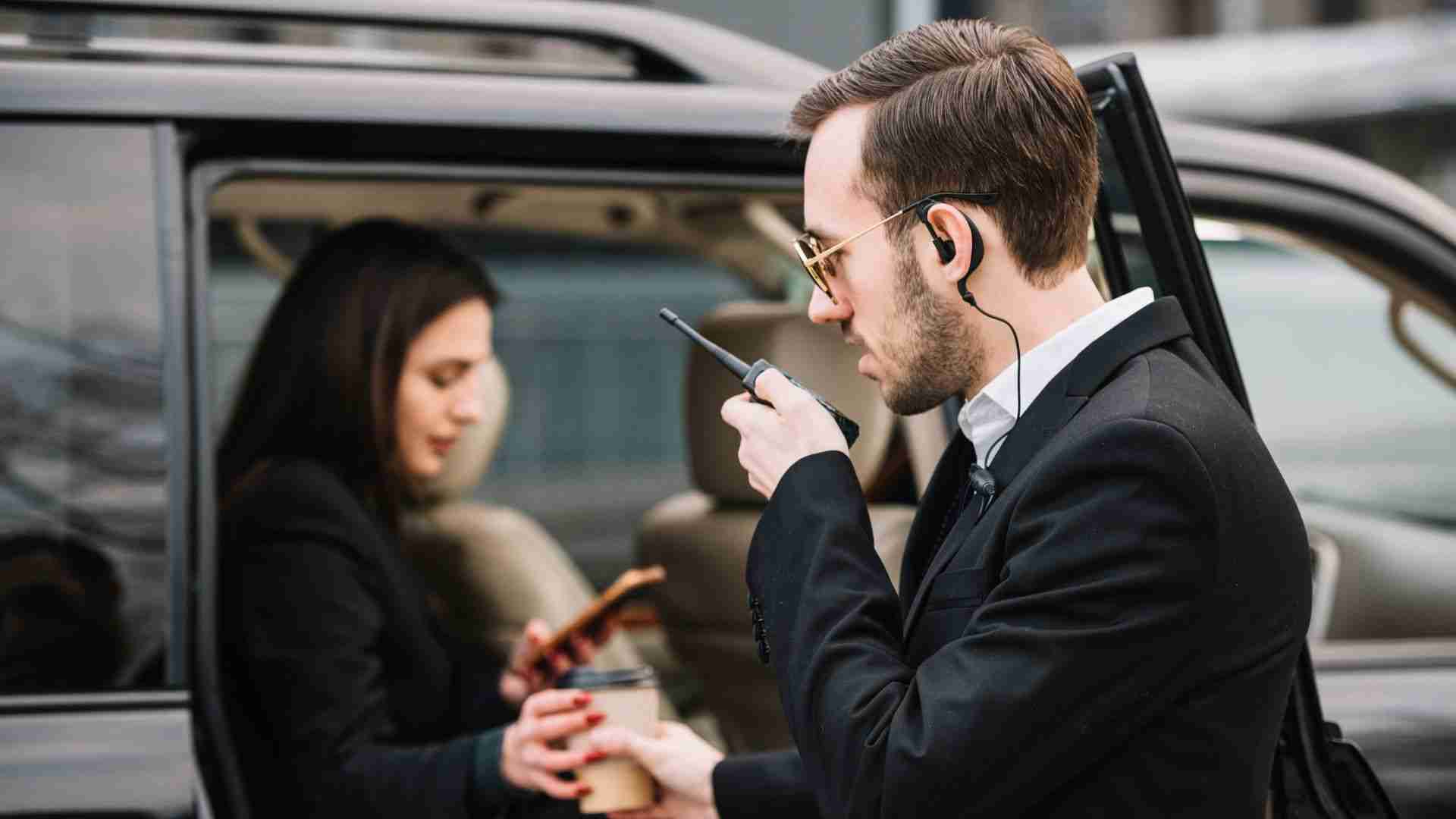 Airport Chauffeur Service with driver and passenger.