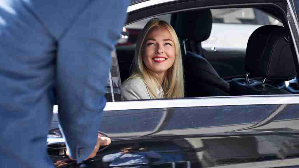 vip chauffeur service business group entering vehicle
