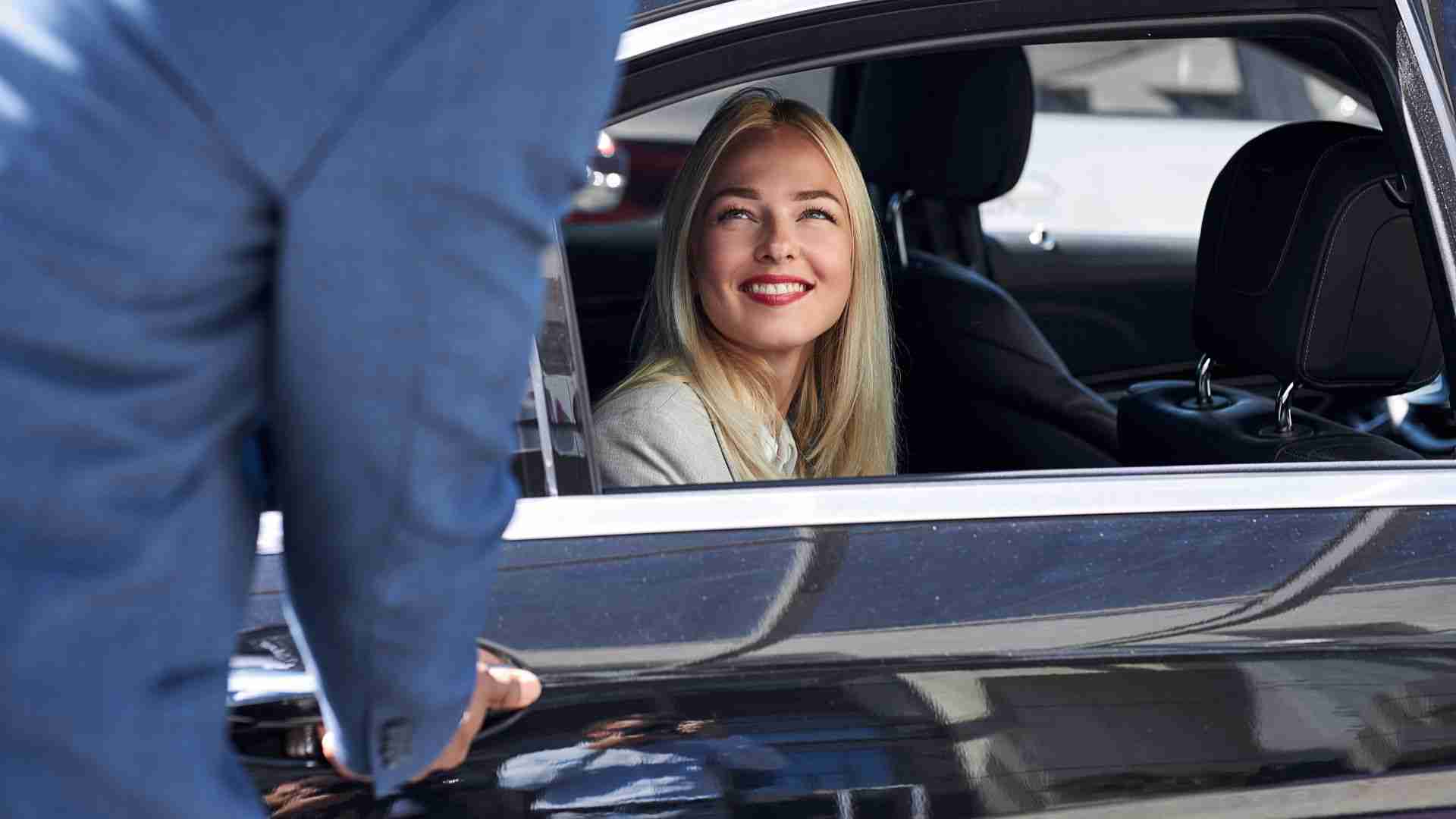 vip chauffeur service business group entering vehicle